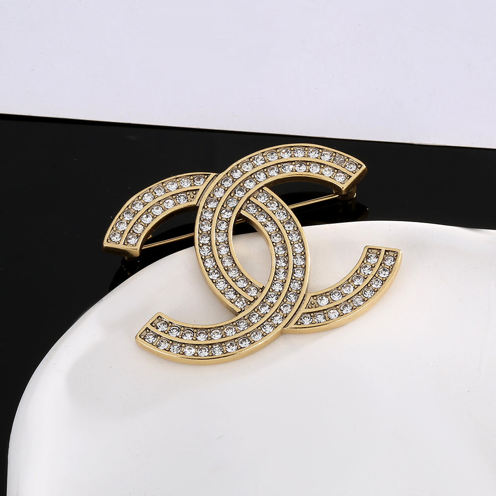 18K CC Diamonds Brooch