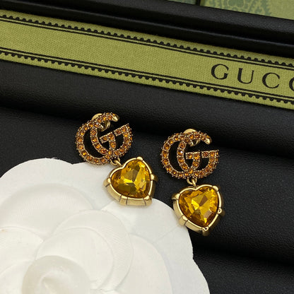 Boucles d'oreilles en cristal jaune Double G 18 carats