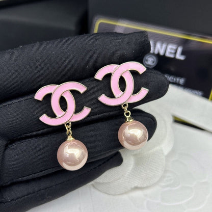 Boucles d'oreilles perles roses 18 carats CC