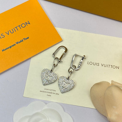 Boucles d'oreilles coeur en diamant Louis 18 carats