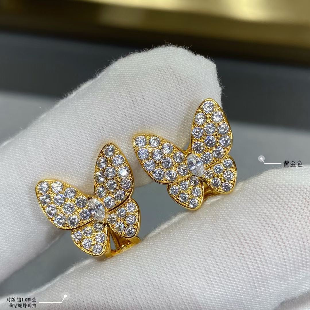 Boucles d'oreilles deux diamants papillon 18 carats