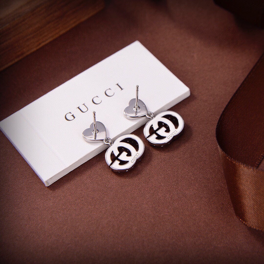 Boucles d'oreilles de course Double G 18 carats