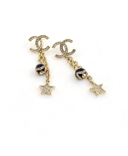 Boucles d'oreilles en perles étoiles CC 18 carats