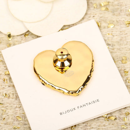 Broche coeur noir 18K CC