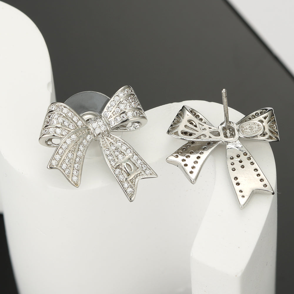 Boucles d'oreilles diamants nœud papillon CC 18 carats