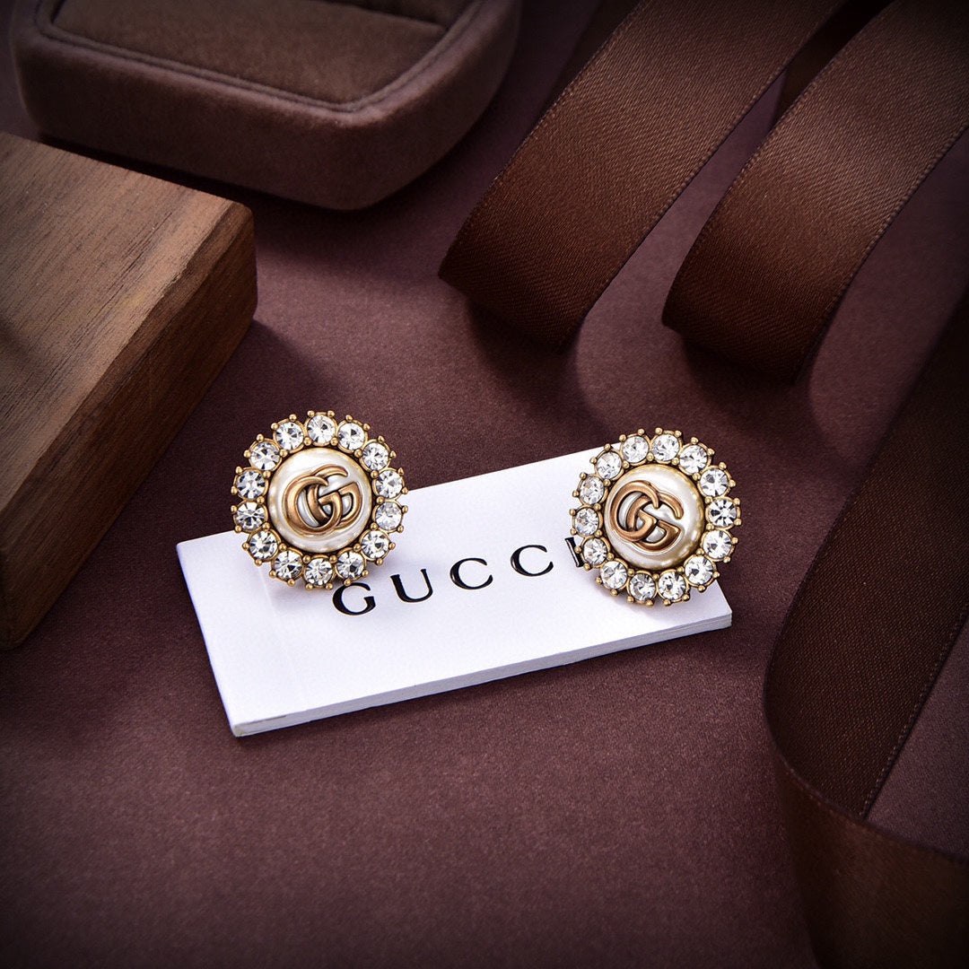 Boucles d'oreilles en cristaux de fleurs Double G 18 carats