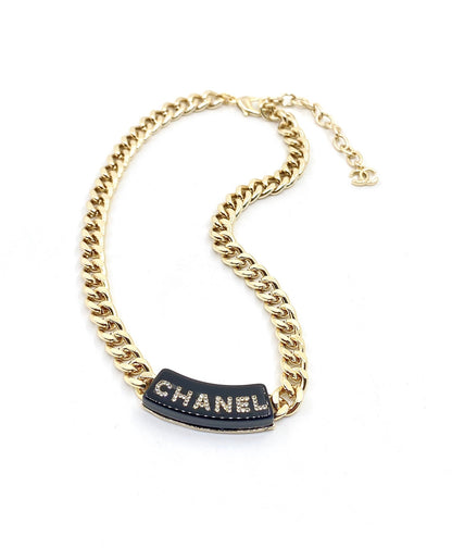 Collier chaîne à logo noir CC 18 carats