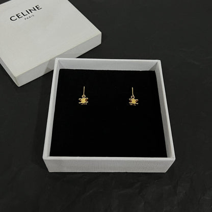 Boucles d'oreilles solitaires Triomphe 18 carats