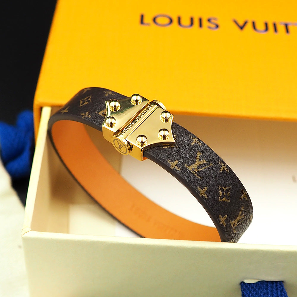 Bracelet vintage en cuir Louis 18 carats