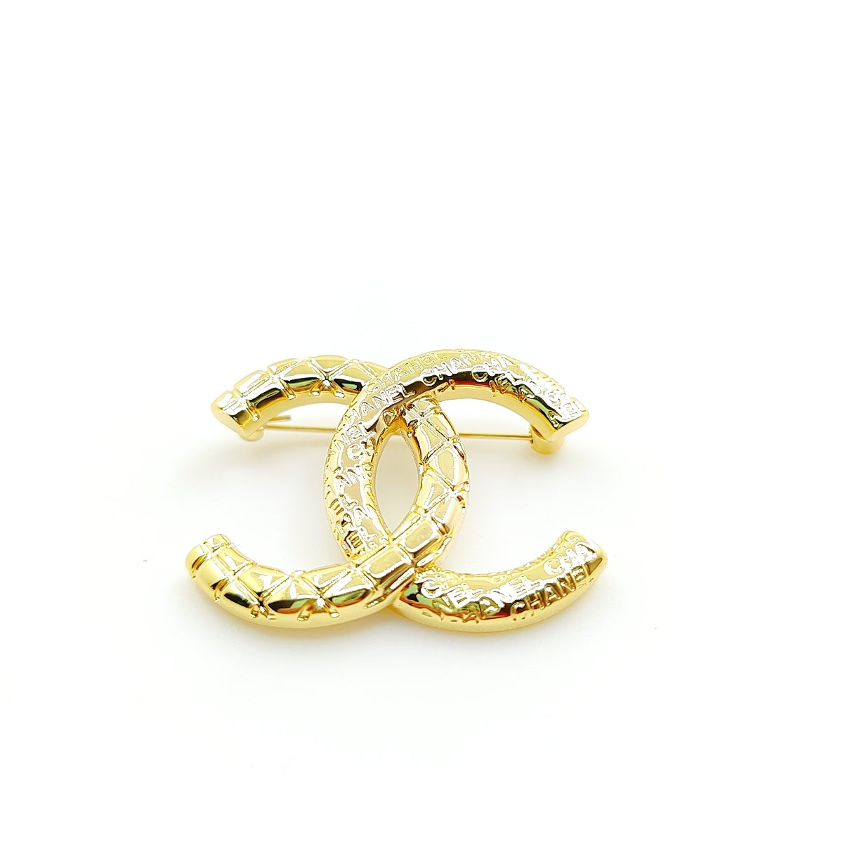 18K CC 24S Brooch