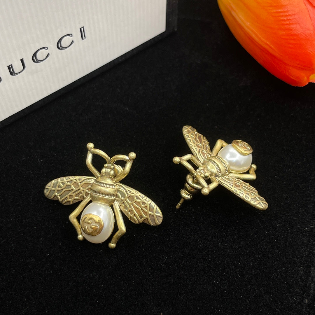 Boucles d'oreilles en perles d'abeille Double G 18 carats