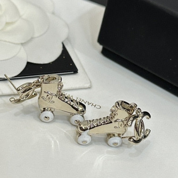 Boucles d'oreilles pendantes en forme de chaussure de skate CC 18 carats