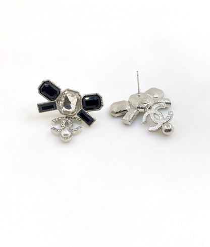 Boucles d'oreilles en cristaux avec nœud papillon CC 18 carats