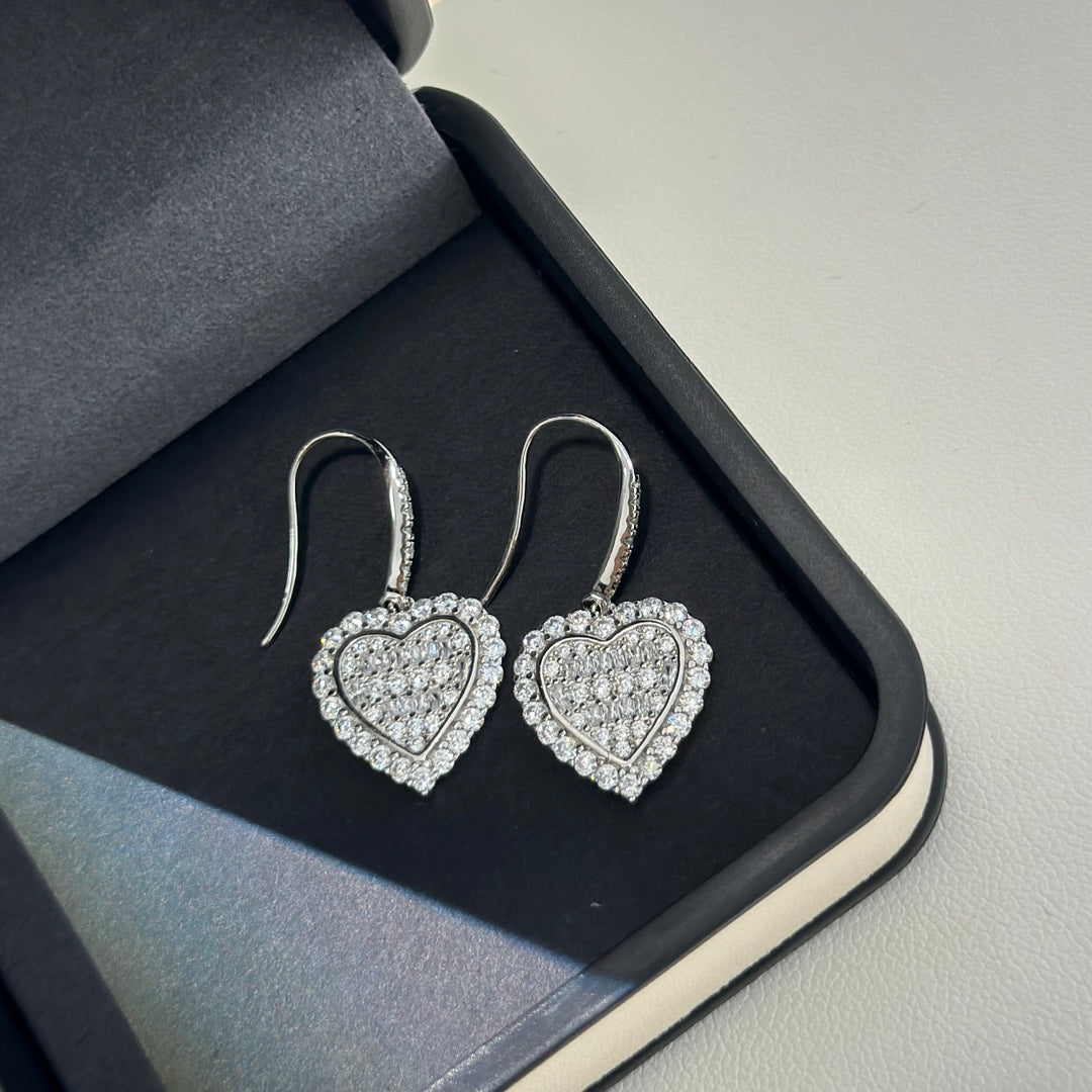 Boucles d'oreilles diamants cœur T 18 carats