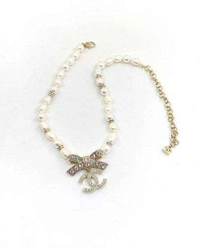 Collier diamants nœud papillon CC 18 carats