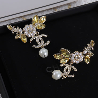 Boucles d'oreilles en cristaux de fleurs CC 18 carats