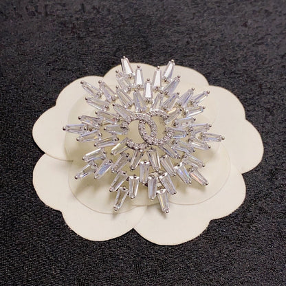 Broche fleur de neige 18K CC