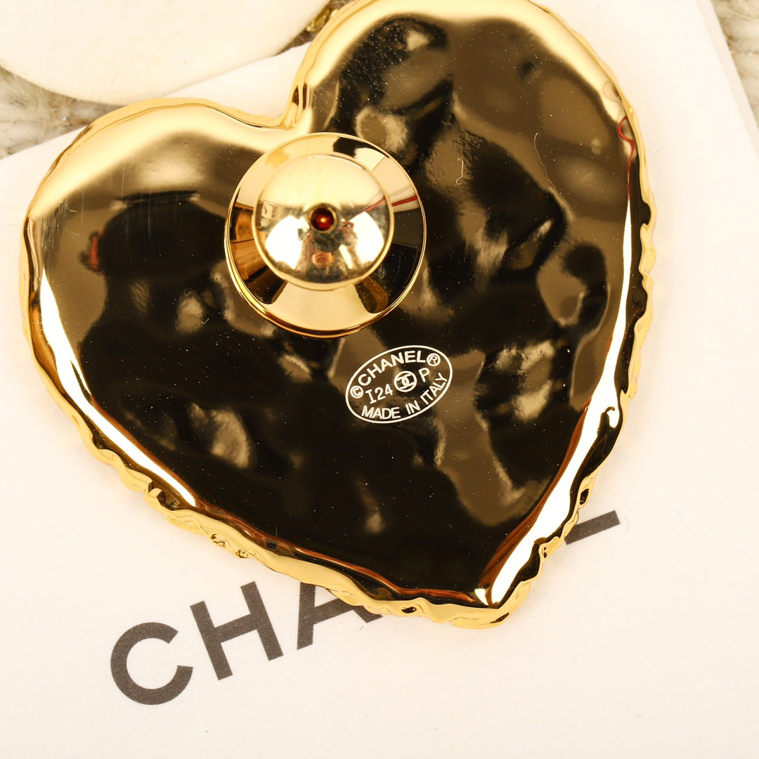 Broche coeur noir 18K CC