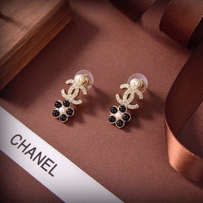 Boucles d'oreilles pendantes papillon CC 18 carats