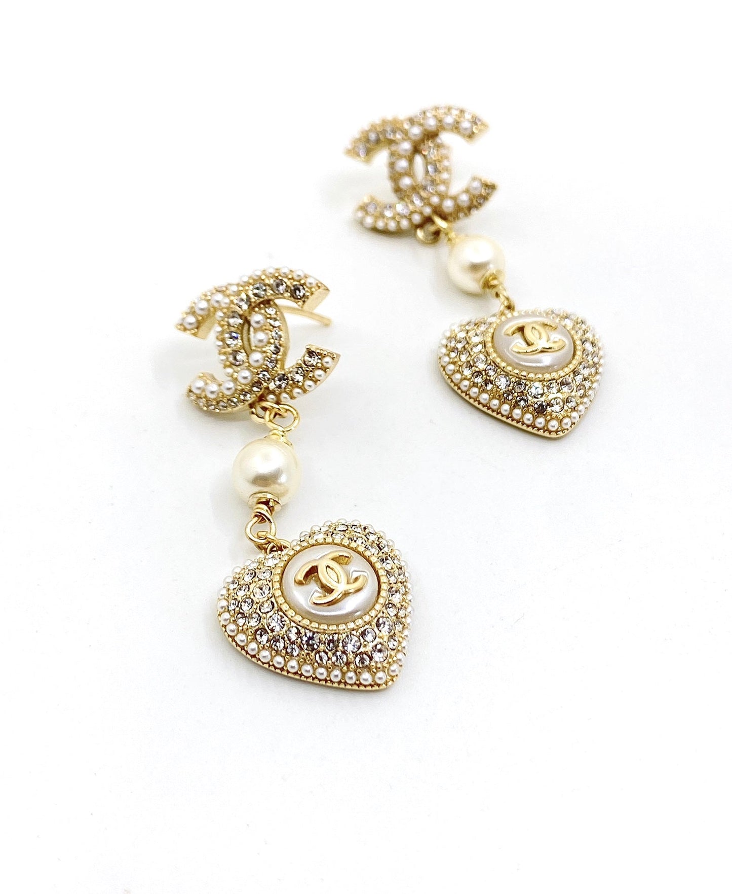 Boucles d'oreilles pendantes en forme de cœur CC 18 carats