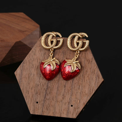 Boucles d'oreilles fraise Double G 18 carats