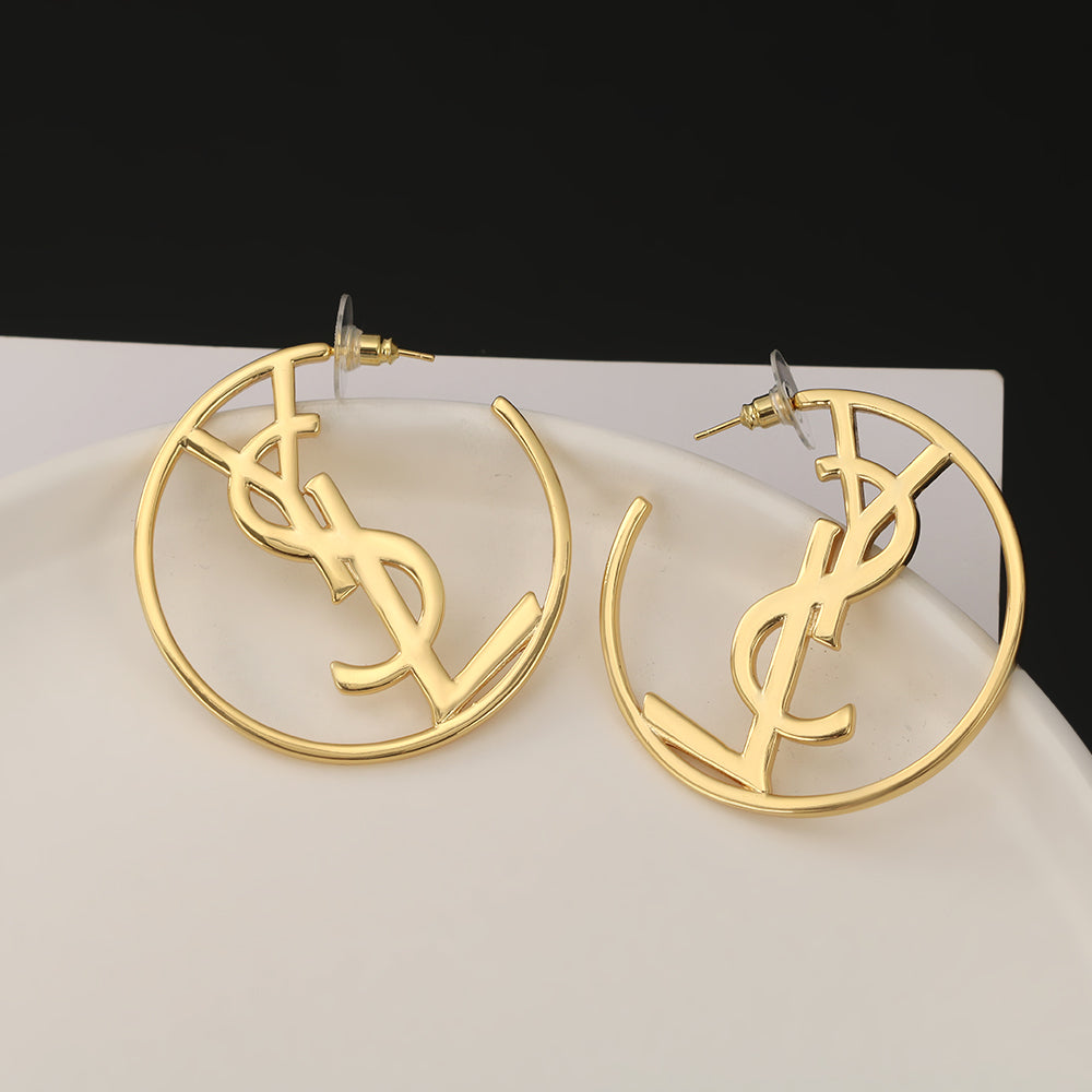 Boucles d'oreilles monogramme Sanit 18 carats