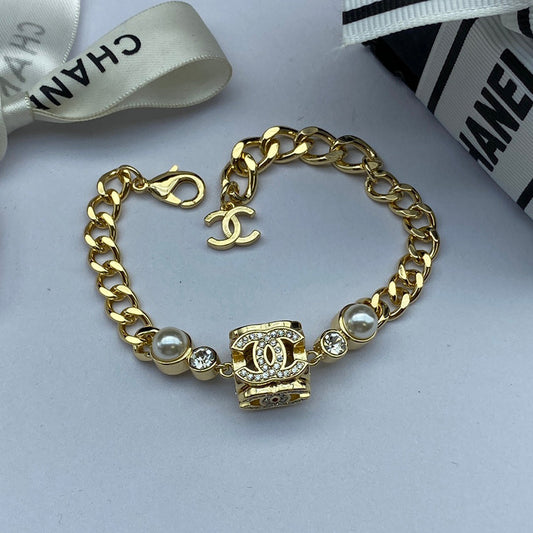 18K CHANEL CC Box Pendant Pearl Bracelet