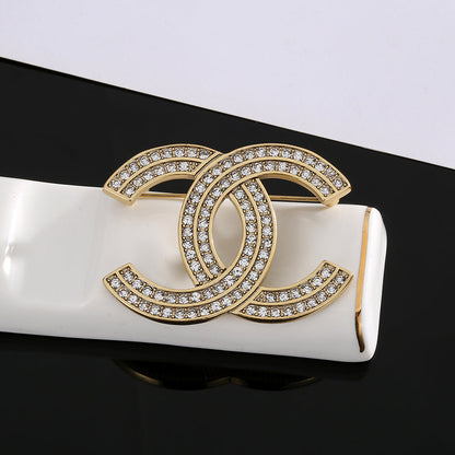 18K CC Diamonds Brooch