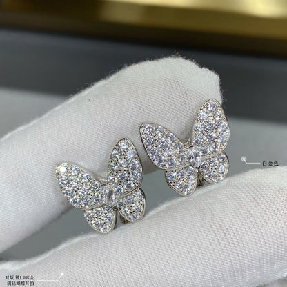 Boucles d'oreilles deux diamants papillon 18 carats