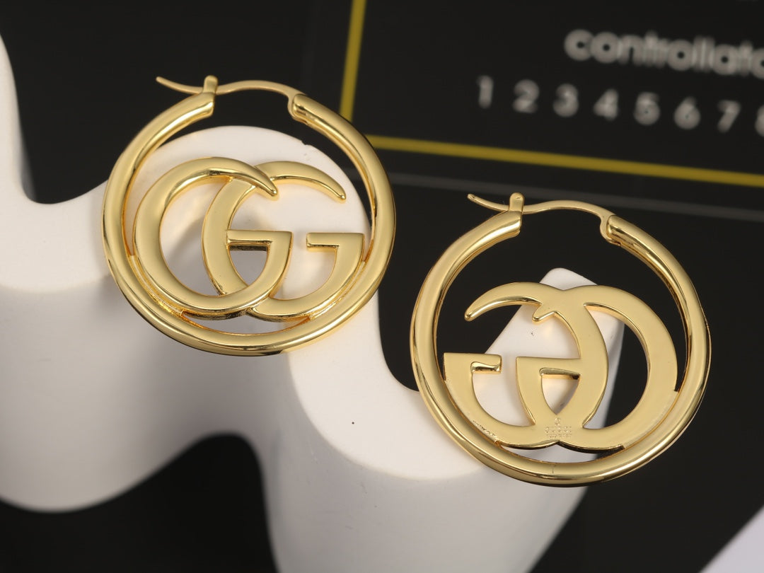 Boucles d'oreilles Double G 18 carats