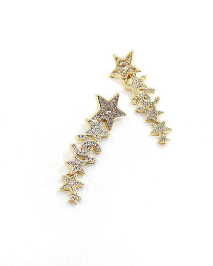 Boucles d'oreilles longues diamants étoiles CC 18 carats