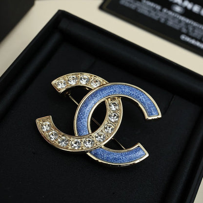 18K CC Sky Blue Diamond Brooch