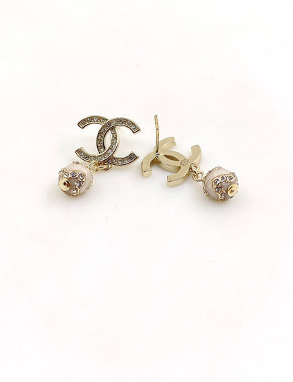 Boucles d'oreilles pendantes en perles CC 18 carats