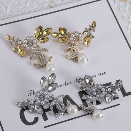 Boucles d'oreilles en cristaux de fleurs CC 18 carats