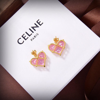 Boucles d'oreilles coeur en cristal rose Triomphe 18 carats