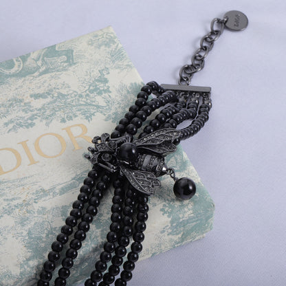 Collier chaîne en perles noires CD Bee 18 carats