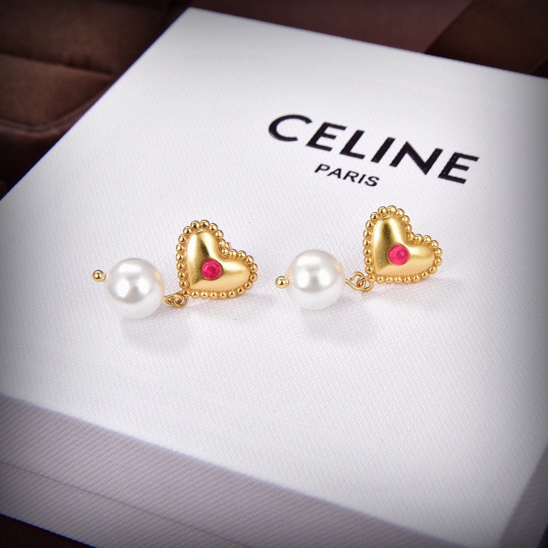 Boucles d'oreilles perles coeur Triomphe 18 carats