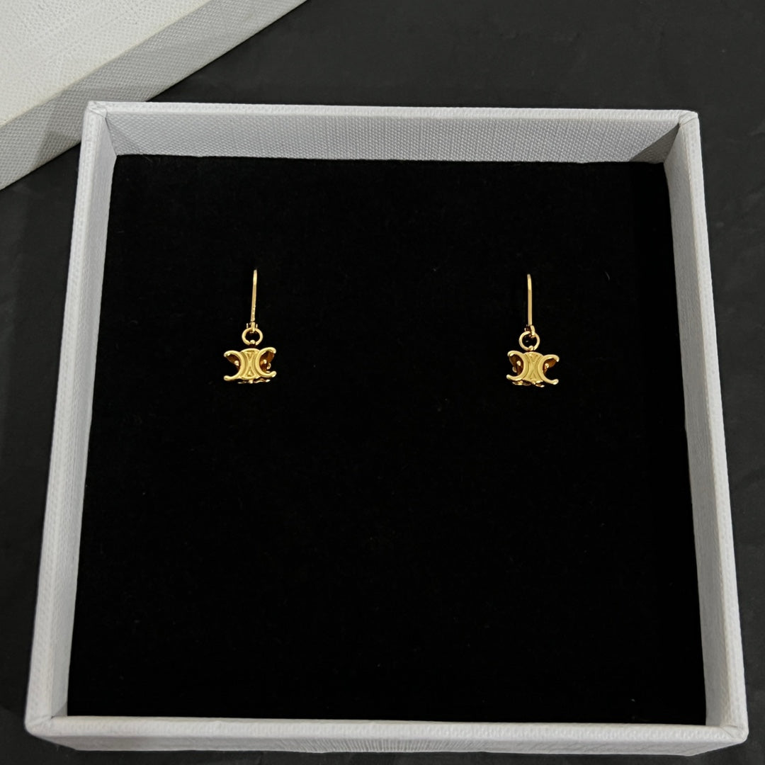 Boucles d'oreilles solitaires Triomphe 18 carats