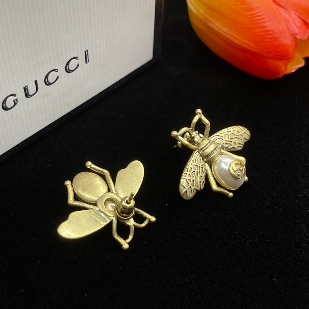 Boucles d'oreilles en perles d'abeille Double G 18 carats