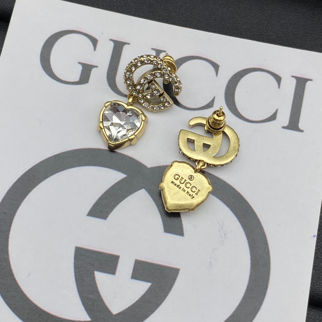 Boucles d'oreilles pendantes en cristal Double G 18 carats