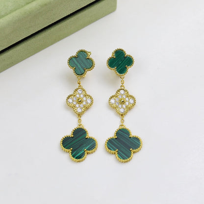 Boucles d'oreilles trèfle à trois motifs malachite Magic Alhambra 18 carats