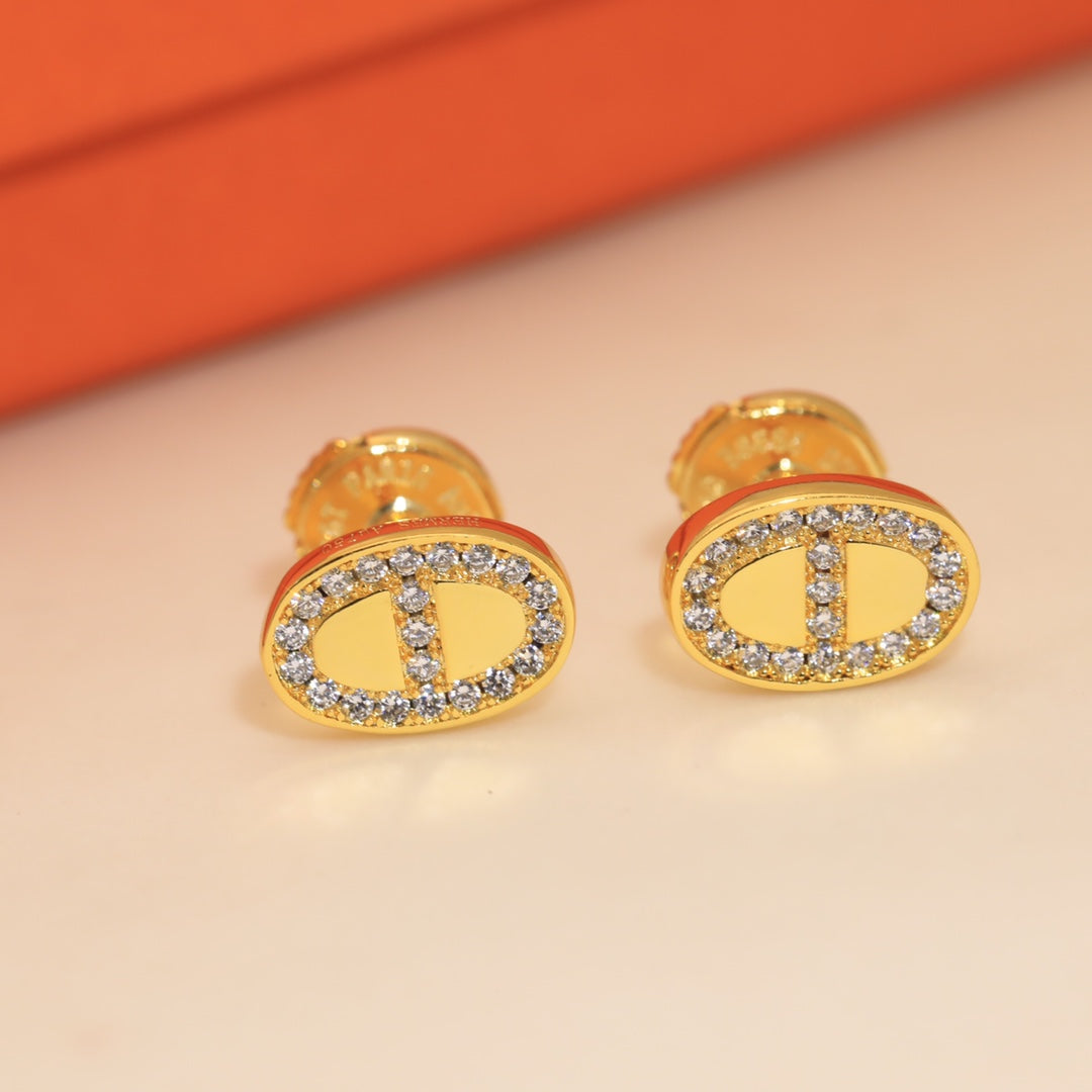 Boucles d'oreilles H en diamants mini farandole 18 carats