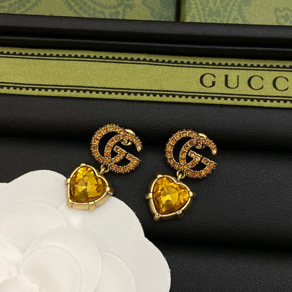 Boucles d'oreilles en cristal jaune Double G 18 carats