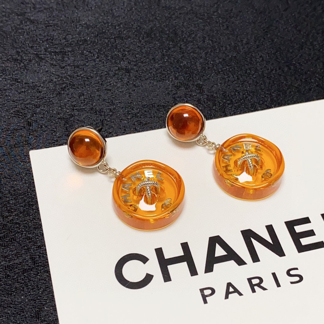 Boucles d'oreilles pendantes orange CC 18 carats