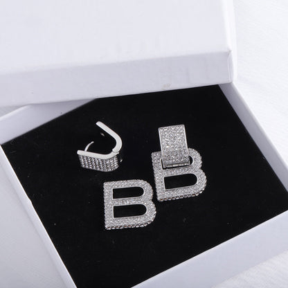 Boucles d'oreilles en diamant sablier BB 18 carats