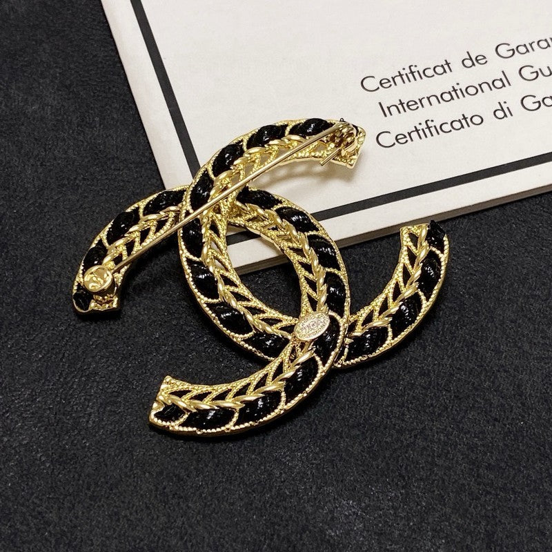 CC Leather Gold Brooch
