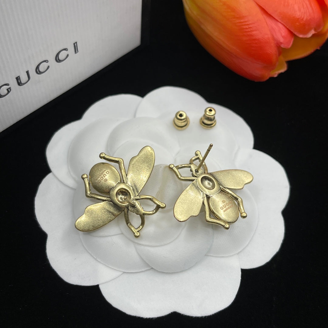 Boucles d'oreilles en perles d'abeille Double G 18 carats