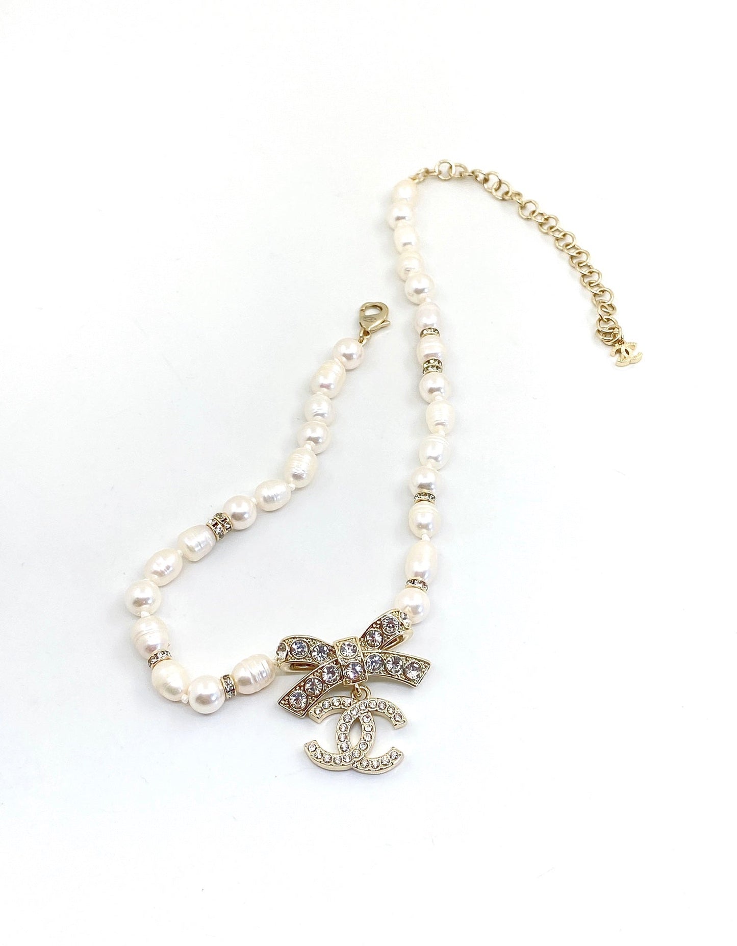 Collier diamants nœud papillon CC 18 carats