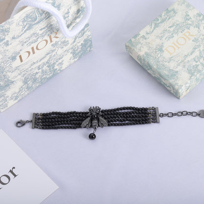 Bracelet de perles noires CD Bee 18K