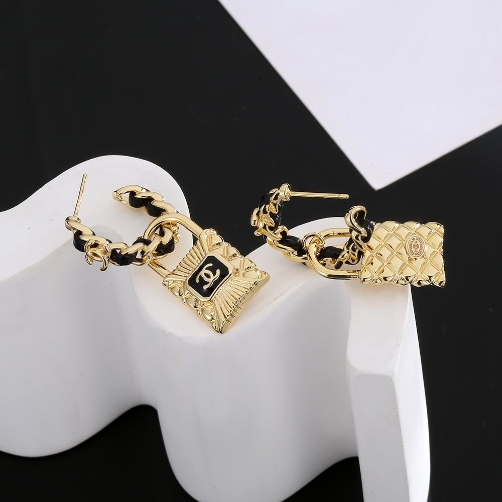 Boucles d'oreilles cadenas CC 18 carats